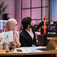 smart-bearded-male-office-manager-and-muslim-femal-2024-12-13-05-49-30-utc